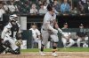 Detroit Tigers's Kerry Carpenter watches after hitting a solo home run during the sixth inning of a baseball game against the Chicago White Sox in Chicago, Monday, June 2, 2025. (AP Photo/Nam Y. Huh)