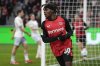 FILE - Leverkusen's Jeremie Frimpong celebrates after he scored his side's second goal during the German Bundesliga soccer match between Bayer Leverkusen and TSG Hoffenheim at the BayArena in Leverkusen, Germany, Sunday, Feb. 2, 2025. (AP Photo/Martin Meissner, File)