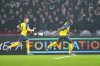 FILE - Union SG's Promise David, right, celebrates after scoring his side's second goal during the Europa League play-off soccer match between Ajax and Union Saint-Gilloise at the Johan Cruyff ArenA in Amsterdam, Netherlands, Thursday, Feb. 20, 2025. (AP Photo/Peter Dejong, file)