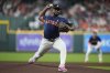 Houston Astros starting pitcher Ronel Blanco throws during the first inning of a baseball game against the Cincinnati Reds in Houston, Sunday, May 11, 2025. (AP Photo/Ashley Landis)