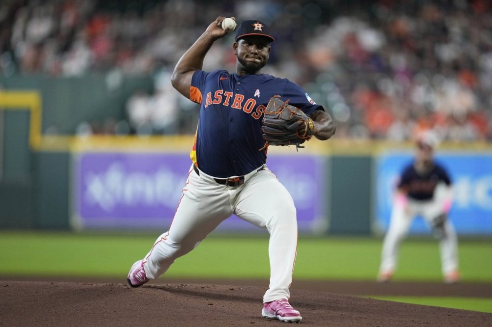 Houston Astros starting pitcher Ronel Blanco throws during the first inning of a baseball game against the Cincinnati Reds in Houston, Sunday, May 11, 2025. (AP Photo/Ashley Landis)