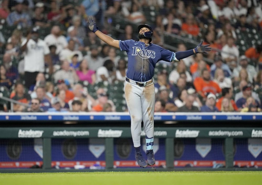 Tampa Bay Rays' Junior Caminero (13) celebrates his three-run home run against Houston Astros relief pitcher Bryan King during the seventh inning of a baseball game, Thursday, May 29, 2025, in Houston. (AP Photo/Karen Warren)