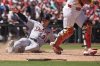 Detroit Tigers' Colt Keith scores during the eighth inning of a baseball game against the St. Louis Cardinals Wednesday, May 21, 2025, in St. Louis. (AP Photo/Jeff Roberson)