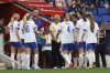 England coach Sarina Wiegman speaks with the players during the women's Nations League soccer match between Spain and England at the RCD Espanyol Stadium, in Barcelona, Spain, Tuesday, June 3, 2025. (AP Photo/Joan Monfort)