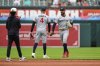 Minnesota Twins' Carlos Correa (4) and Byron Buxton, right, celebrate their team's victory over the Baltimore Orioles after the first baseball game of a doubleheader, Wednesday, May 14, 2025, in Baltimore. (AP Photo/Stephanie Scarbrough)