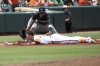 Minnesota Twins third baseman Royce Lewis tags put Baltimore Orioles' Ryan Mountcastle at third as Mountcastle tried to stretch a double into a triple during the fourth inning of a baseball game, Thursday, May 15, 2025, in Baltimore(AP Photo/Daniel Kucin Jr.)