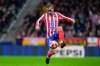 FILE - Atletico Madrid's Antoine Griezmann controls a ball during a Champions League opening phase soccer match at the Riyadh Air Metropolitano stadium in Madrid, Spain, Jan. 21, 2025. (AP Photo/Manu Fernandez, file)