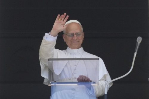 Pope Leo XIV blesses faithful and pilgrims gathered in St. Peter's Square for the Regina Caeli noon prayer, Sunday, May 25, 2025. (AP Photo/Andrew Medichini)