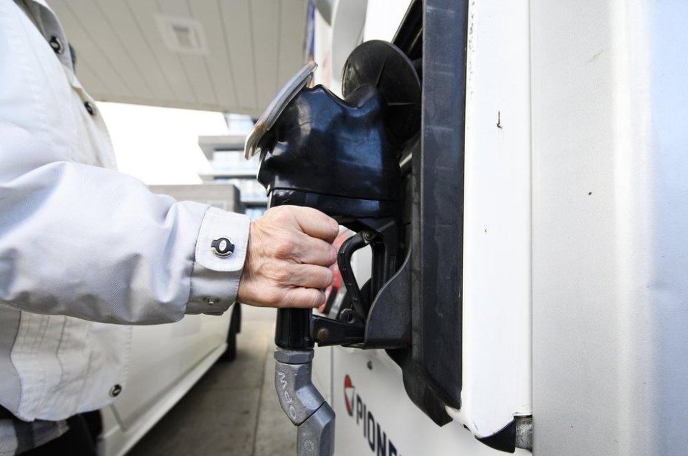 The end of the consumer carbon price at the start of April drove inflation down sharply, Statistics Canada said Tuesday. A woman gasses up at a gas station in Mississauga, Ont., Tuesday, February 13, 2024. THE CANADIAN PRESS/Christopher Katsarov