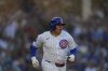 Chicago Cubs designated hitter Moisés Ballesteros (25) runs but is forced out at first base during the second inning of a baseball game against the Miami Marlins, Tuesday, May 13, 2025, in Chicago. (AP Photo/Erin Hooley)