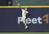 Milwaukee Brewers outfielder Jackson Chourio catches a ball hit by Minnesota Twins' Royce Lewis during the eighth inning of a baseball game, Sunday, May 18, 2025, in Milwaukee. (AP Photo/Jeffrey Phelps)
