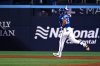 Toronto Blue Jays' Anthony Santander (25) runs the bases after hitting a two-run home run against the San Diego Padres in fifth inning MLB baseball action in Toronto on Tuesday, May 20, 2025. THE CANADIAN PRESS/Jon Blacker