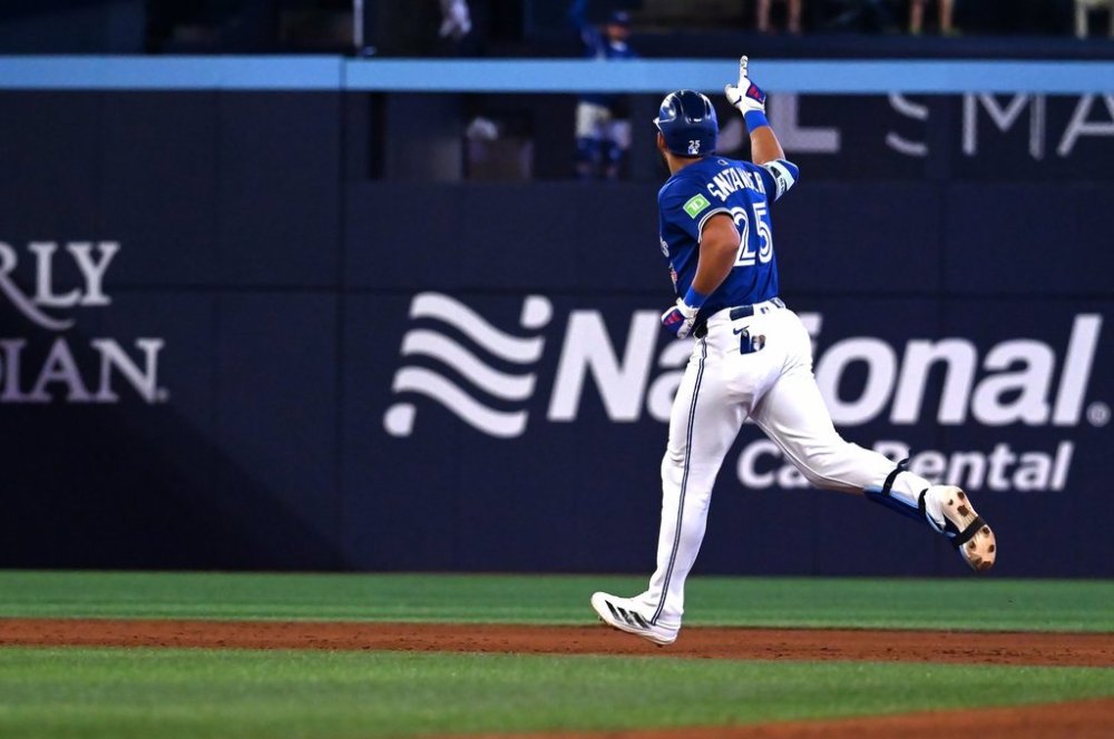 Toronto Blue Jays' Anthony Santander (25) runs the bases after hitting a two-run home run against the San Diego Padres in fifth inning MLB baseball action in Toronto on Tuesday, May 20, 2025. THE CANADIAN PRESS/Jon Blacker