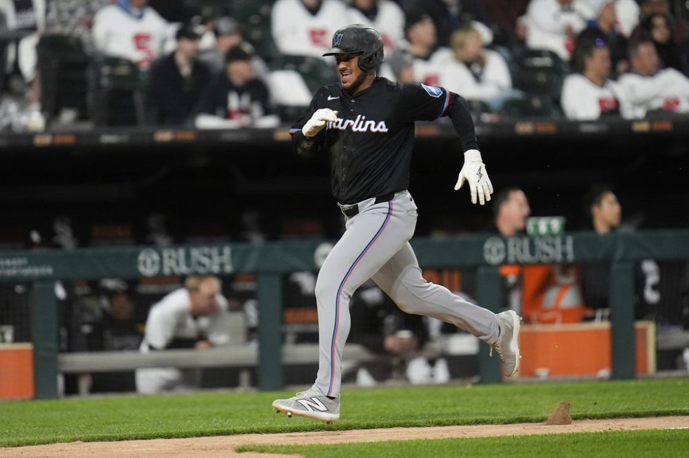 Miami Marlins' Dane Myers runs the bases to score on a triple by Eric Wagaman during the eighth inning of a baseball game against the Chicago White Sox, Saturday, May 10, 2025, in Chicago. (AP Photo/Erin Hooley)