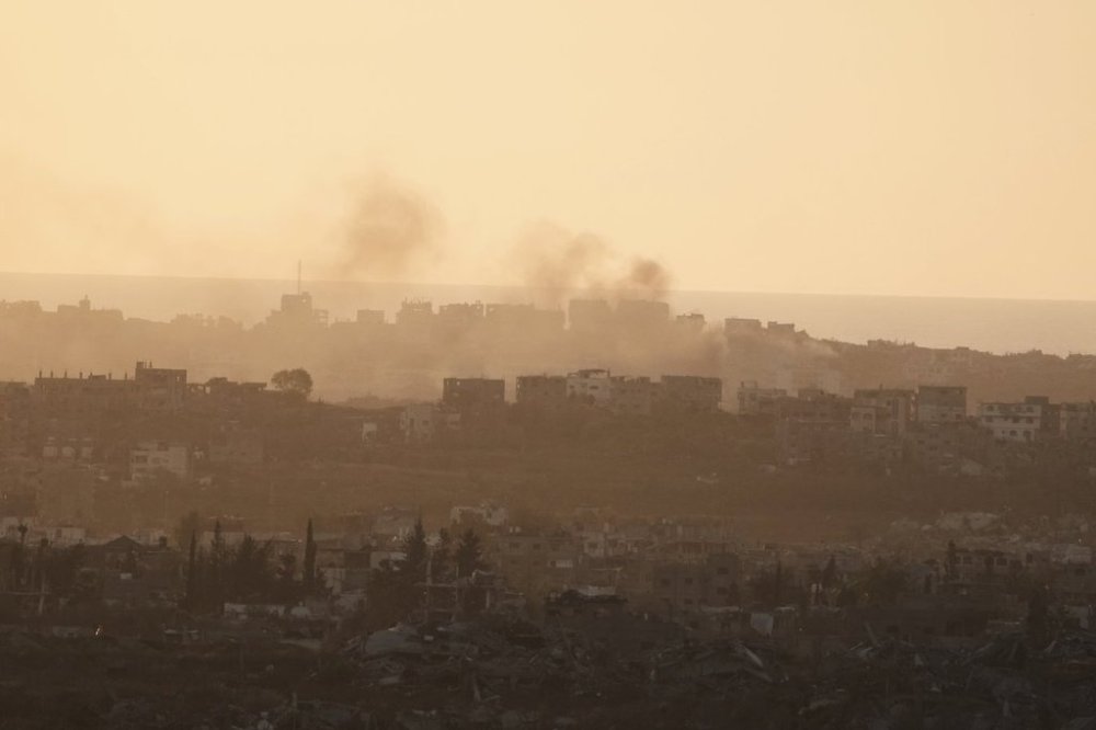 Smoke rises following an Israeli army bombardment in Gaza Strip, seen from southern Israel, Tuesday, May 20, 2025. (AP Photo/Maya Alleruzzo)