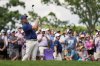 Rory McIlroy, of Northern Ireland, watches his tee shot on the 17th hole during the third round of the PGA Championship golf tournament at the Quail Hollow Club, Saturday, May 17, 2025, in Charlotte, N.C. (AP Photo/George Walker IV)
