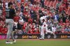 Arizona Diamondbacks starting pitcher Brandon Pfaadt (32), left, waits as St. Louis Cardinals' Masyn Winn, right, rounds the bases after hitting a solo home run in the third inning of a baseball game, Sunday, May 25, 2025, in St. Louis. (AP Photo/Joe Puetz)