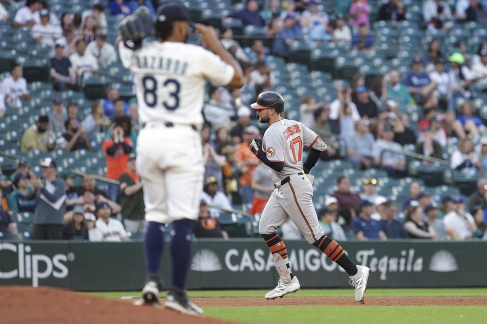 Baltimore Orioles' Colton Cowser jogs the bases after hitting a home run off Seattle Mariners pitcher Eduard Bazardo (83) during the sixth inning of a baseball game, Tuesday, June 3, 2025, in Seattle. (AP Photo/Jason Redmond)