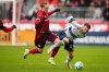 Toronto FC forward Ola Brynhildsen (9) and Vancouver Whitecaps defender Tristan Blackmon (33) collide as they run towards the ball during second half MLS soccer action in Toronto on Saturday, March 29, 2025. THE CANADIAN PRESS/Arlyn McAdorey