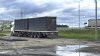 This photo released by Governor of Irkutsk region Igor Kobzev telegram channel on Sunday, June 1, 2025, shows a truck used to release some of the Ukrainian drones that attacked Russian air bases in the Irkutsk region, more than 4,000 kilometers (2,500 miles) from Ukraine. (Governor of Irkutsk region Igor Kobzev telegram channel via AP)