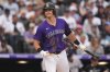 Colorado Rockies' Michael Toglia reacts after striking out against New York Yankees starting pitcher Max Fried in the seventh inning of a baseball game Saturday, May 24, 2025, in Denver. (AP Photo/David Zalubowski)
