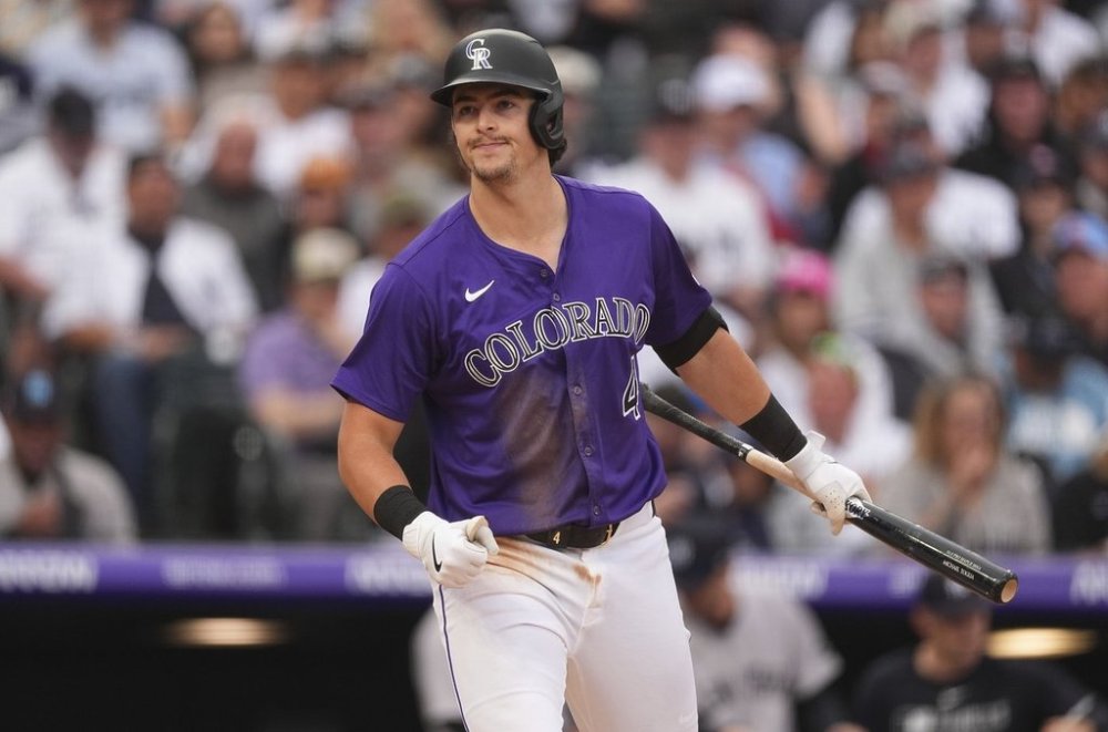 Colorado Rockies' Michael Toglia reacts after striking out against New York Yankees starting pitcher Max Fried in the seventh inning of a baseball game Saturday, May 24, 2025, in Denver. (AP Photo/David Zalubowski)