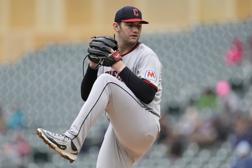 Cleveland Guardians starting starting pitcher Gavin Williams (32) winds up to deliver during the first inning in the second baseball game of a doubleheader against the Minnesota Twins, Wednesday, May 21, 2025, in Minneapolis. (AP Photo/Abbie Parr)