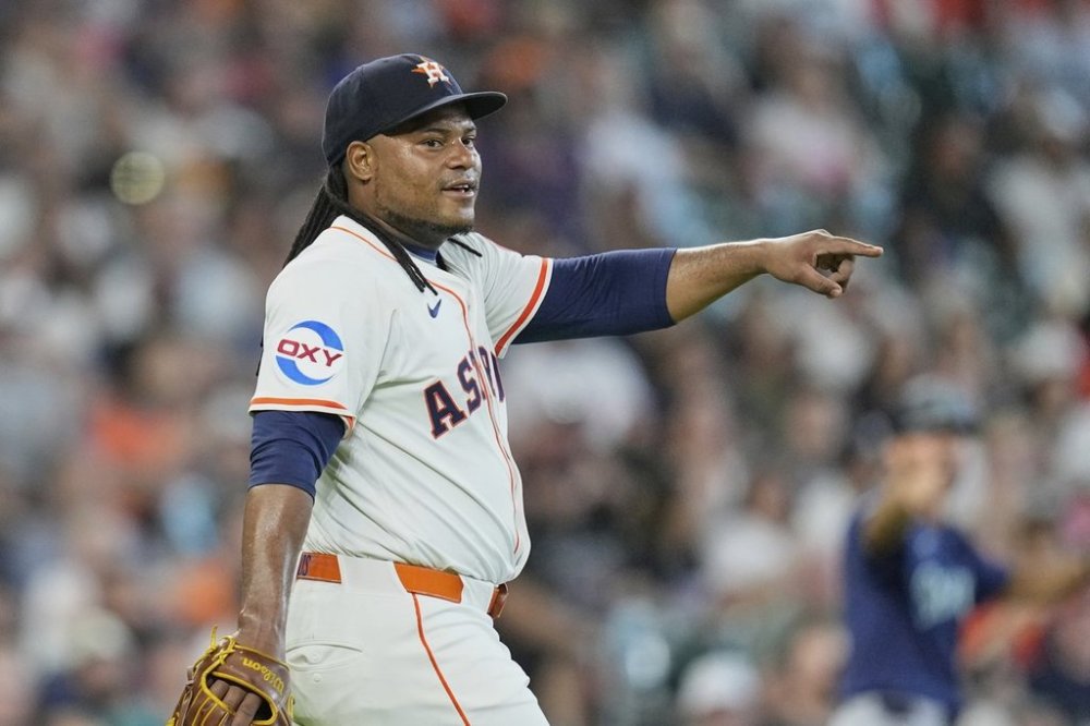 Houston Astros starting pitcher Framber Valdez points to the infield during the sixth inning of a baseball game against the Seattle Mariners Saturday, May 24, 2025, in Houston. (AP Photo/David J. Phillip)