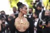 FILE -Bella Hadid poses for photographersat the premiere of 'Three Floors' at the 74th international film festival, Cannes, southern France on July 11, 2021. (AP Photo/Brynn Anderson, File)