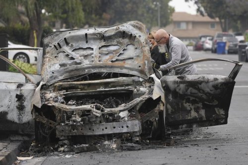 at the site of a plane crash Friday, May 23, 2025, in San Diego. (AP Photo/Gregory Bull)