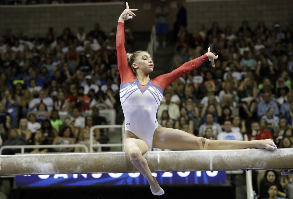 FILE - Ashton Locklear competes on the balance beam during the women's U.S. Olympic gymnastics trials in San Jose, Calif., July 10, 2016. (AP Photo/Gregory Bull, File)