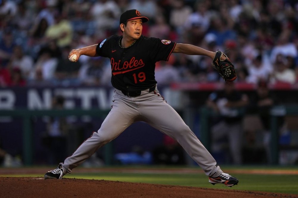 Baltimore Orioles starting pitcher Tomoyuki Sugano throws to the plate during the first inning of a baseball game against the Los Angeles Angels, Friday, May 9, 2025, in Anaheim, Calif. (AP Photo/Mark J. Terrill)