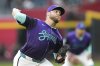 Arizona Diamondbacks starting pitcher Corbin Burnes throws against the Colorado Rockies during the first inning of a baseball game Friday, May 16, 2025, in Phoenix. (AP Photo/Ross D. Franklin)