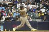 San Diego Padres Manny Machado (13) hits a home run during the eighth inning of a baseball game against the Milwaukee Brewers Friday, June 6, 2025, in Milwaukee. (AP Photo/Kayla Wolf)