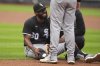 Teammates check on Chicago White Sox pitcher Miguel Castro (60) after he was injured during the ninth inning of a baseball game against the New York Mets Wednesday, May 28, 2025, in New York. (AP Photo/Frank Franklin II)