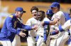 Seattle Mariners' Randy Arozarena, center right, celebrates with teammates after hitting a walkoff single that scored Julio Rodriguez during the ninth inning of a baseball game against the Minnesota Twins, Sunday, Jun 1, 2025, in Seattle. (AP Photo/Ryan Sun)