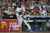 Kansas City Royals' Maikel Garcia (11) doubles during the fifth inning of a baseball game against the Houston Astros in Houston, Wednesday, May 14, 2025. Vinnie Pasquantino scored. (AP Photo/Ashley Landis)