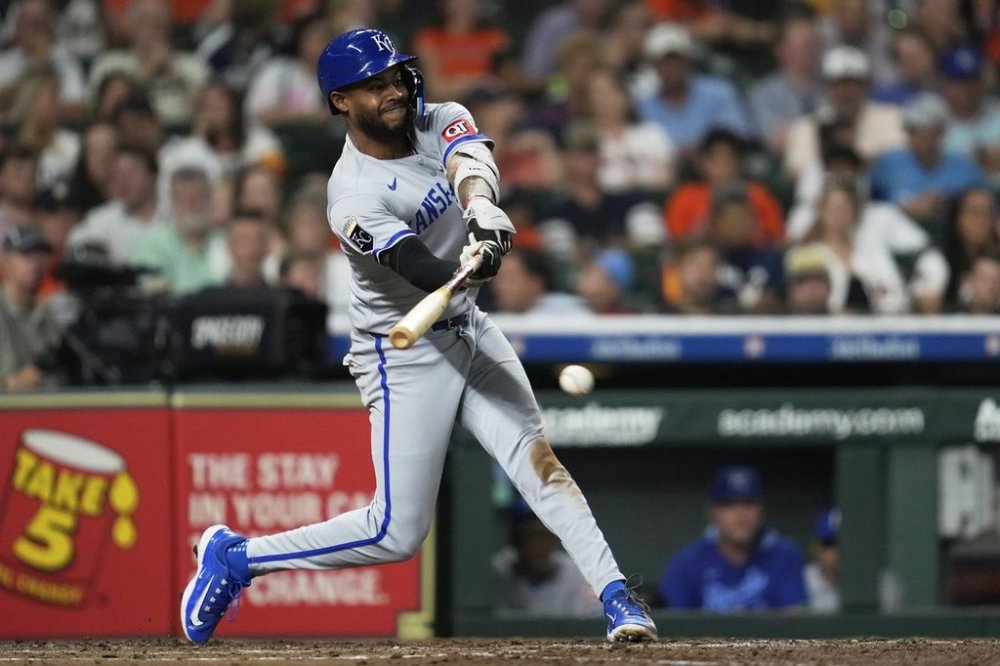 Kansas City Royals' Maikel Garcia (11) doubles during the fifth inning of a baseball game against the Houston Astros in Houston, Wednesday, May 14, 2025. Vinnie Pasquantino scored. (AP Photo/Ashley Landis)