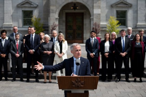 Prime Minister Mark Carney speaks to reporters following the swearing-in ceremony for cabinet members at Rideau Hall in Ottawa, on Tuesday. (Spencer Colby / The Canadian Press)