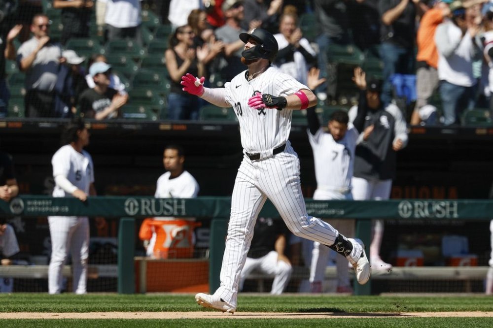 Chicago White Sox's Tim Elko rounds the bases after hitting a three-run home run against the Miami Marlins during the sixth inning of a baseball game Sunday, May 11, 2025, in Chicago. (AP Photo/Kamil Krzaczynski)