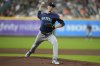 Seattle Mariners starting pitcher George Kirby throws during the first inning of a baseball game against the Houston Astros in Houston, Thursday, May 22, 2025. (AP Photo/Ashley Landis)