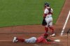 Los Angeles Angels' Zach Neto slides home on a hit by Nolan Schanuel in the third inning of a baseball game against the Boston Red Sox, Tuesday June 3, 2025, in Boston. (AP Photo/Robert F. Bukaty)
