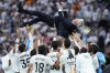 Real Madrid's head coach Carlo Ancelotti is tossed into the air by his players after defeating Real Sociedad at the end of a Spanish La Liga soccer match, at Santiago Bernabeu stadium in Madrid, Saturday, May 24, 2025. (AP Photo/Cesar Cebolla)