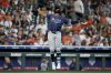 Tampa Bay Rays' Junior Caminero celebrates his solo home run against the Houston Astros during the fourth inning of a baseball game, Saturday, May 31, 2025, in Houston. (AP Photo/Eric Christian Smith)