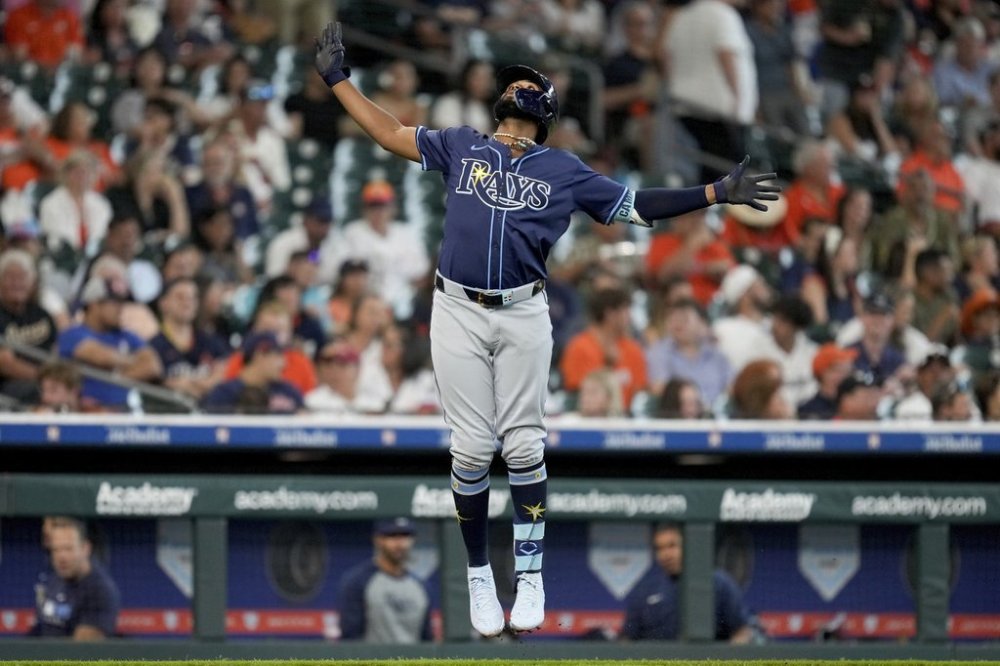 Tampa Bay Rays' Junior Caminero celebrates his solo home run against the Houston Astros during the fourth inning of a baseball game, Saturday, May 31, 2025, in Houston. (AP Photo/Eric Christian Smith)