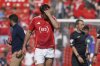 Manchester United's Harry Maguire walks on the pitch in dejection at the end of the English Premier League soccer match between Manchester United and West Ham at Old Trafford stadium in Manchester, England, Sunday, May 11, 2025. (AP Photo/Ian Hodgson)