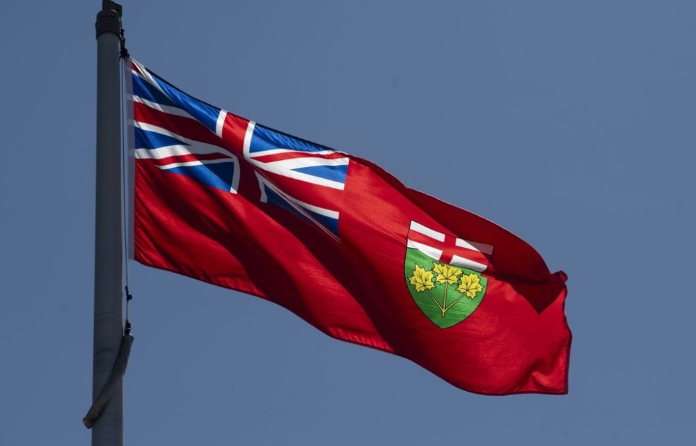 Ontario's provincial flag flies in Ottawa, Monday, July 6, 2020. THE CANADIAN PRESS/Adrian Wyld
