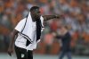 Ivory Coast 's coach Emerse Fae gives instructions to his players during the African Cup of Nations final soccer match between Nigeria and Ivory Coast, at the Olympic Stadium of Ebimpe in Abidjan, Ivory Coast, Sunday, Feb. 11, 2024. (AP Photo/Sunday Alamba)