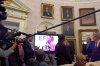 A video plays during a meeting between President Donald Trump and South Africa's President Cyril Ramaphosa in the Oval Office of the White House, Wednesday, May 21, 2025, in Washington. (AP Photo/Evan Vucci)