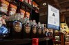 Despite the annual pace of inflation cooling last month, Statistics Canada says consumers continue to pay higher costs for groceries as food prices rose faster in April than they did the previous month. A sign advising that products from the U.S. affected by a tariff will be marked with a symbol at the shelf is seen beside a display of Canadian products in a grocery store in Ottawa, on Wednesday, April 2, 2025. THE CANADIAN PRESS/Justin Tang